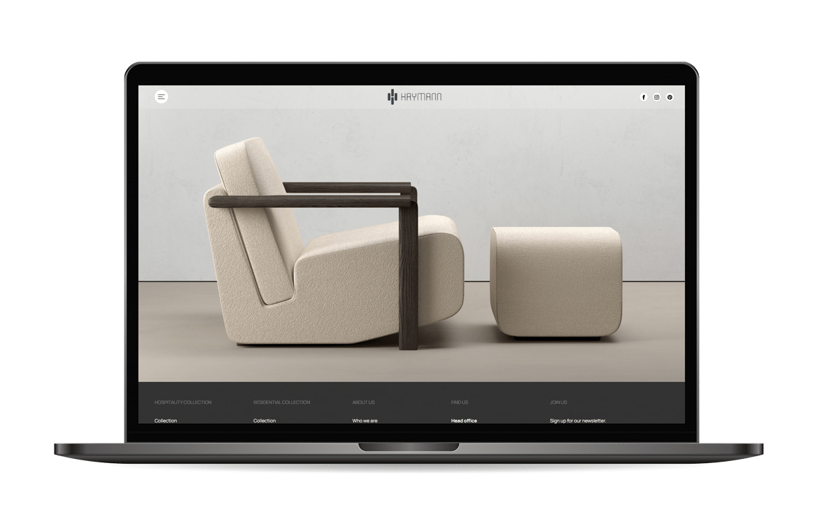 Ordinateur portable montrant un fauteuil et un pouf modernes.